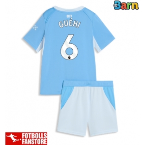 Manchester City Marc Guehi #6 Hemmatröja Barn 2026-27 Kortärmad (+ Korta byxor)