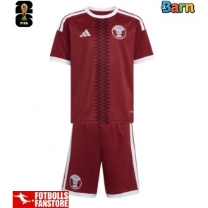 Qatar Hemmatröja Barn VM 2026 Kortärmad (+ Korta byxor)