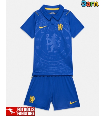 Chelsea Hemmatröja Barn 2026-27 Kortärmad (+ Korta byxor)