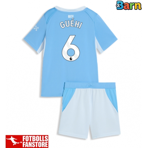 Manchester City Marc Guehi #6 Hemmatröja Barn 2026-27 Kortärmad (+ Korta byxor)